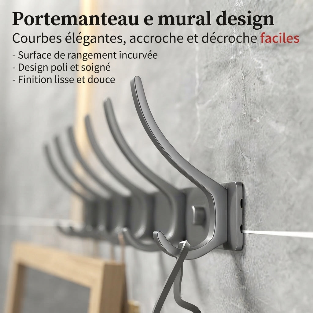 Close-up of smooth curved grey metal wall hooks