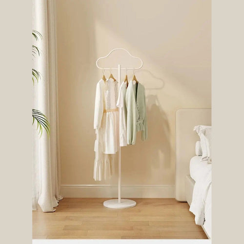 White cloud coat rack with open silhouette in modern bedroom