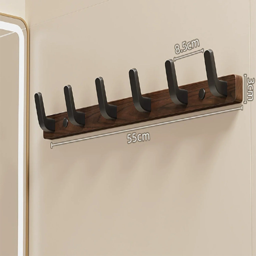 Dark brown wooden wall coat rack with 4 black metal hooks
