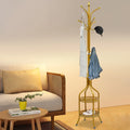 Full view gold coat rack with three hooks and two tiered storage shelves