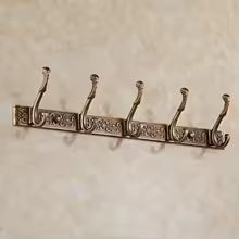 Antique silver wall coat rack with 5 ornate floral hooks